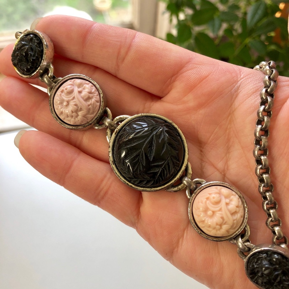 Necklace with black and pink cabochons